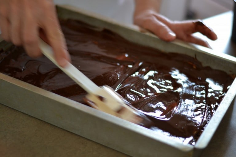 smoothing chocolate layer on top