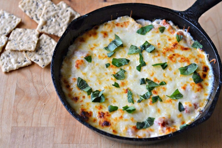 hot caprese dip in a skillet