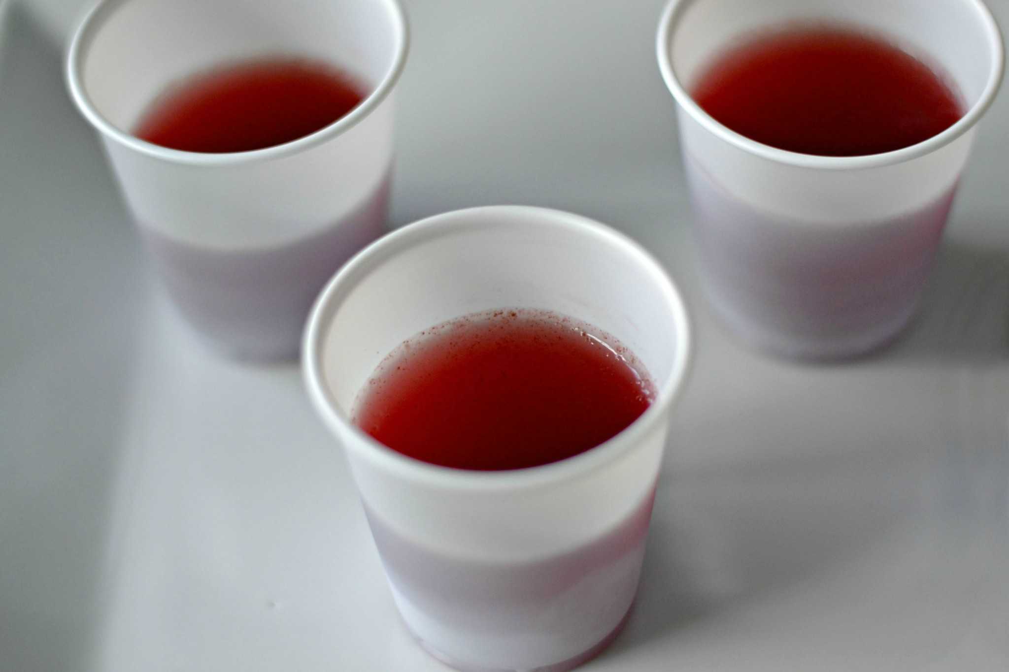 Probiotic gelatin shots in small plastic cups.