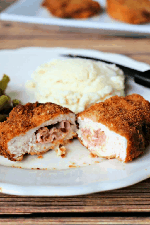 plate with pork cordon bleu and mashed potatoes