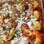 cheesy shells in a baking dish
