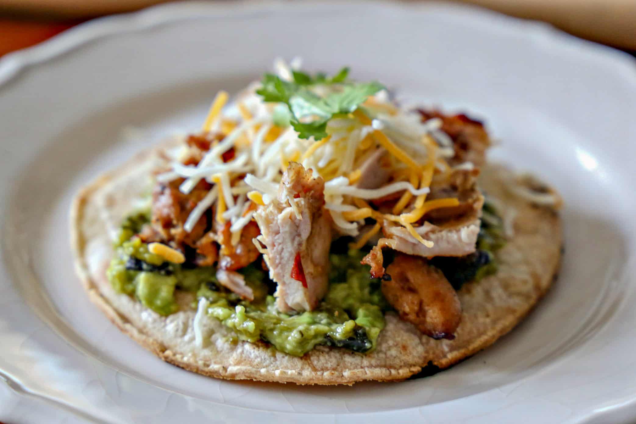 Tostada with toppings.