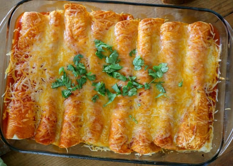 These Cheesy Zesty Enchiladas are easy to make. Zesty Cheesy Enchiladas in a pan