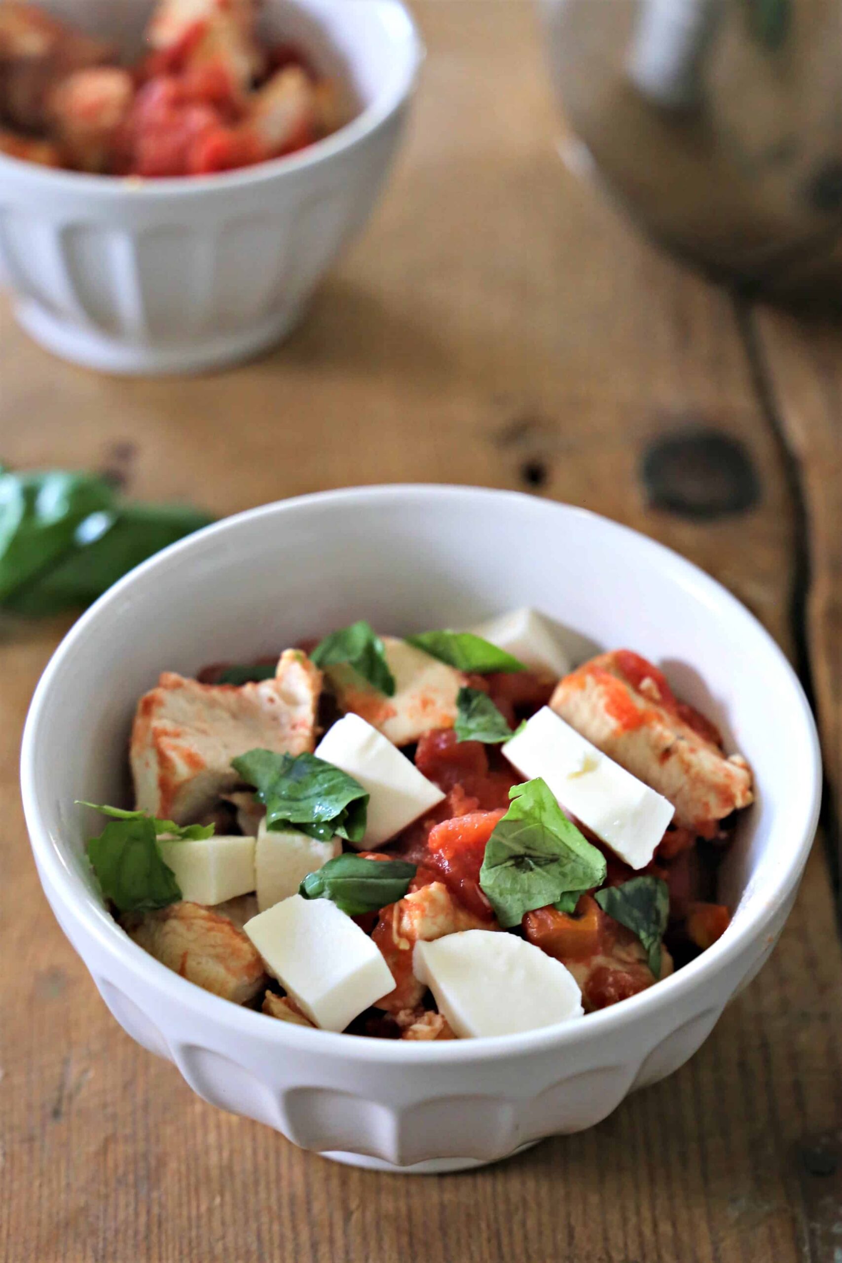 Caprese Chicken Bowl bowl of chicken, tomatoes, mozzarella cheese, and basil
