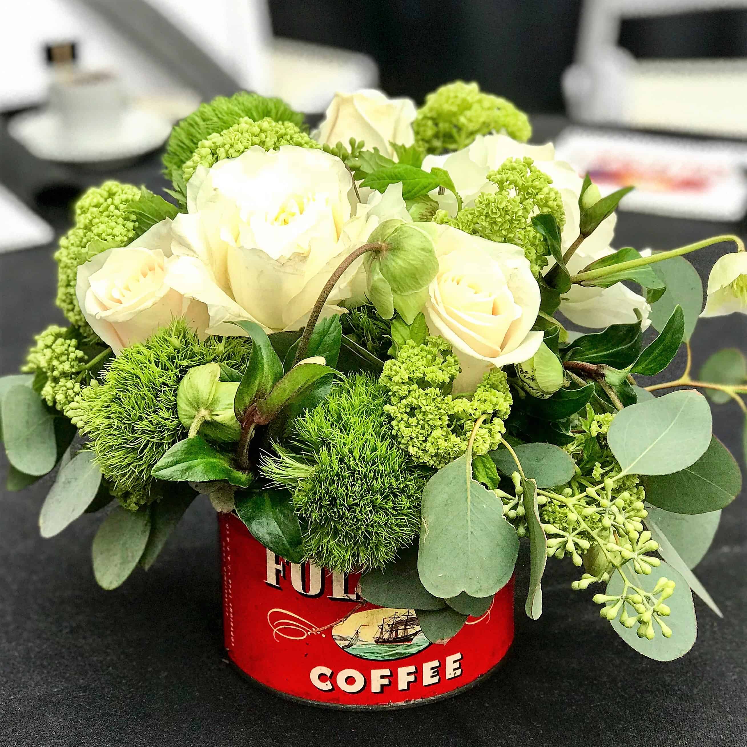 antique can of Folgers coffee with flowers Antique can of Folgers coffee with flowers.