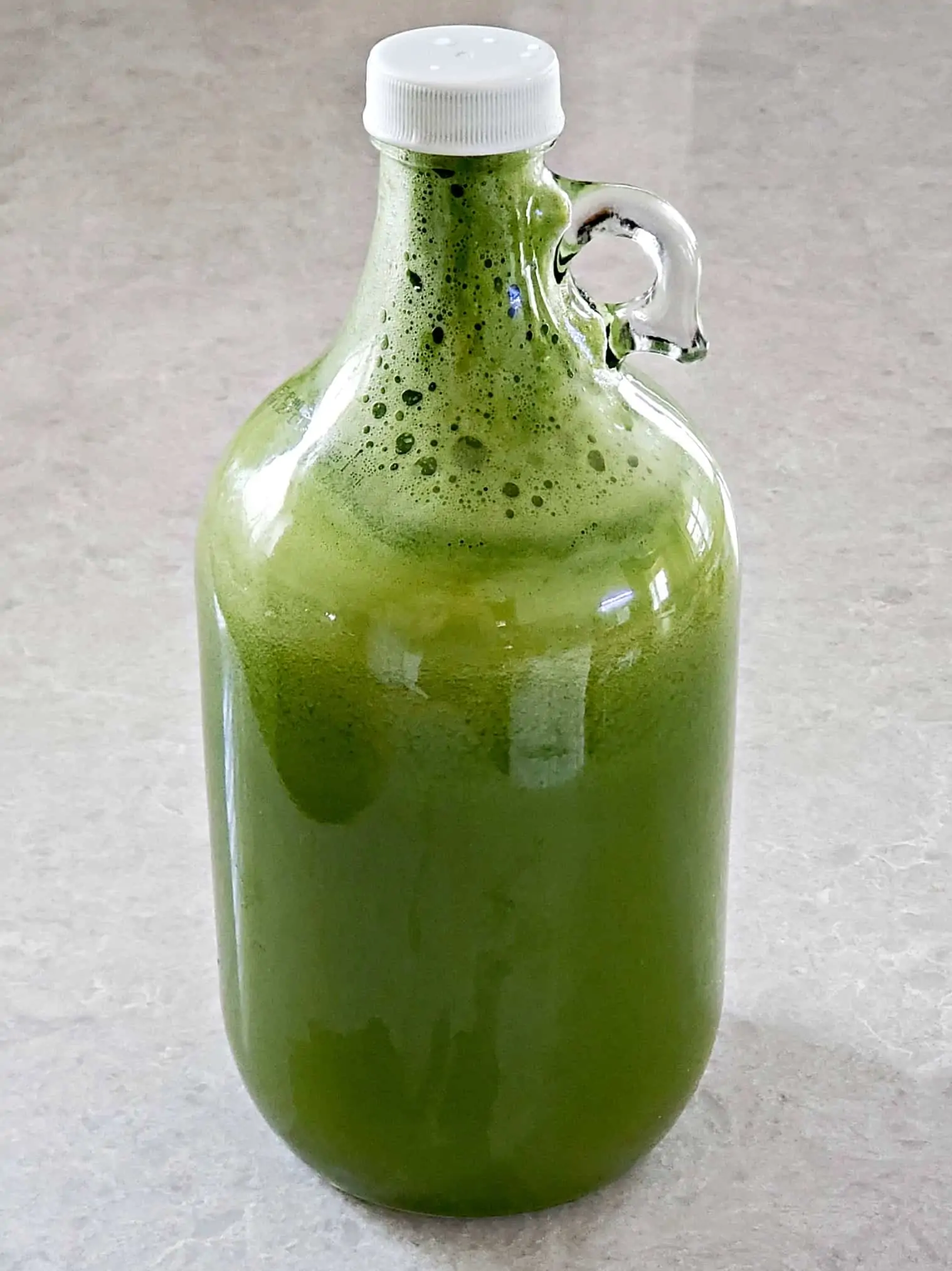 growler of green ginger juice