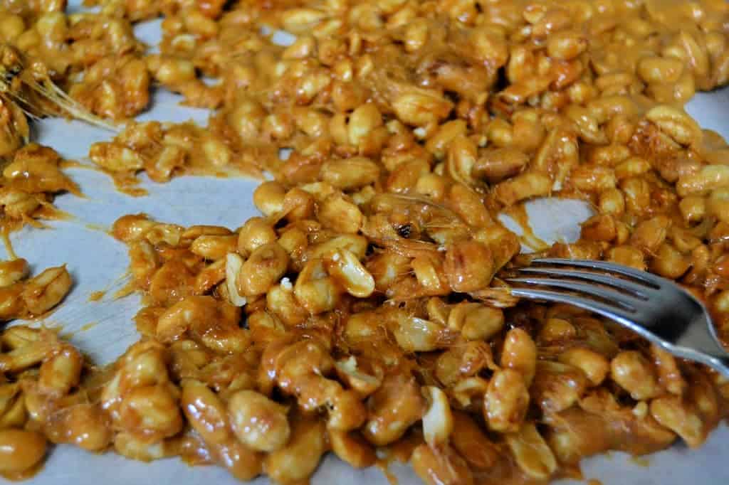 using forks to pull peanut brittle