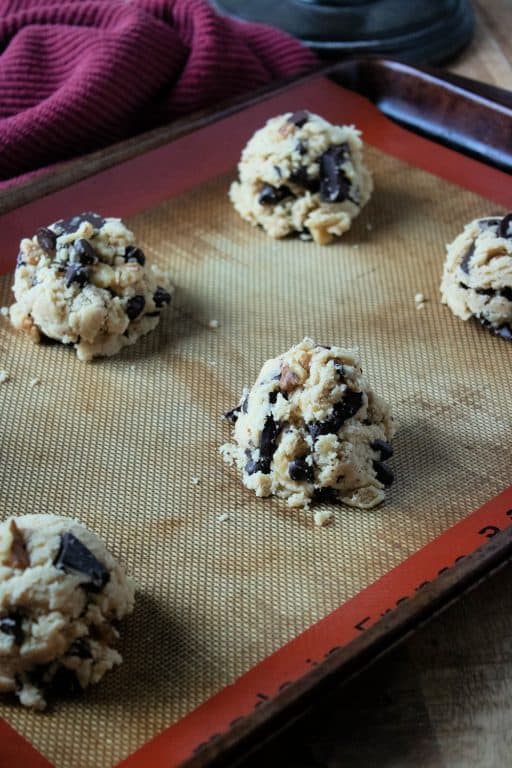chocolate walnut cookie dough on a baking sheet