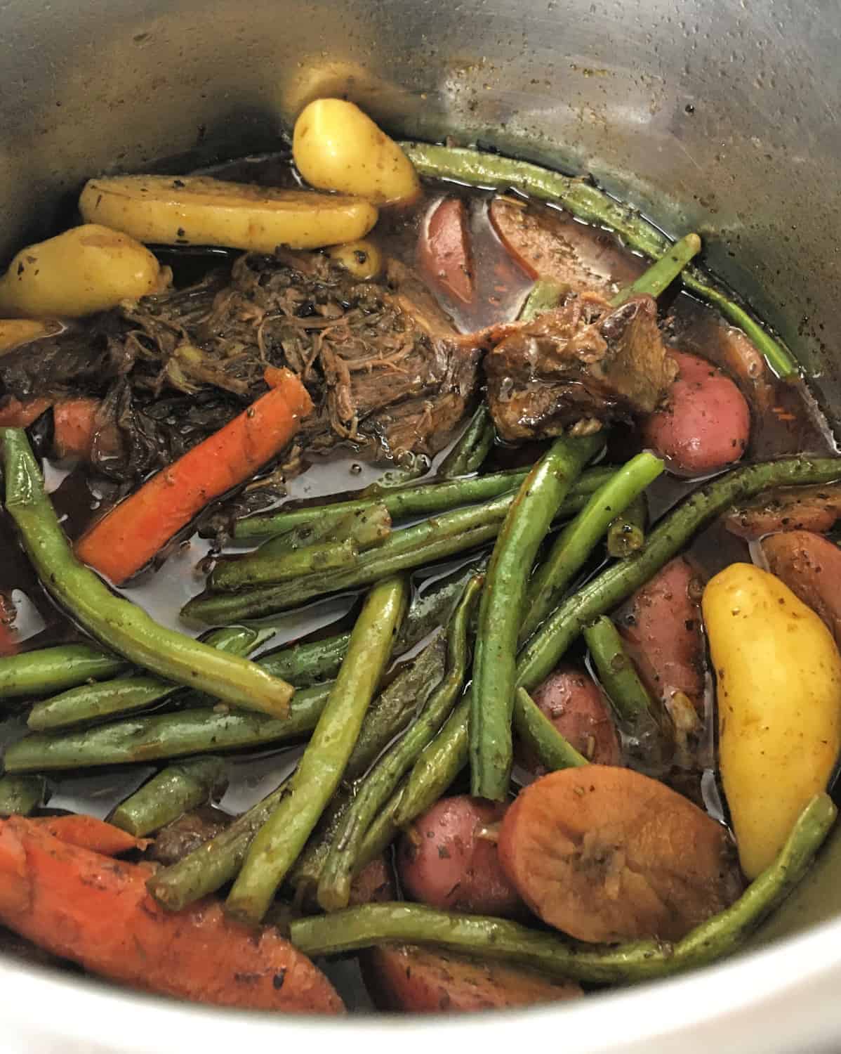 pot roast and vegetables in an Instant Pot