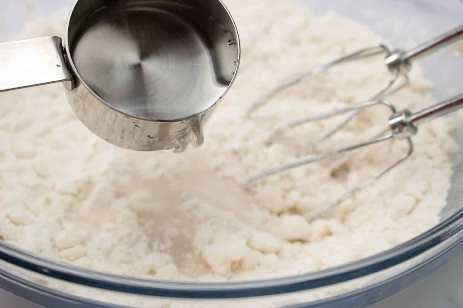 adding melted shortening to flour