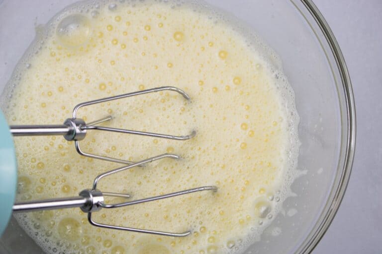 beating eggs and sugar