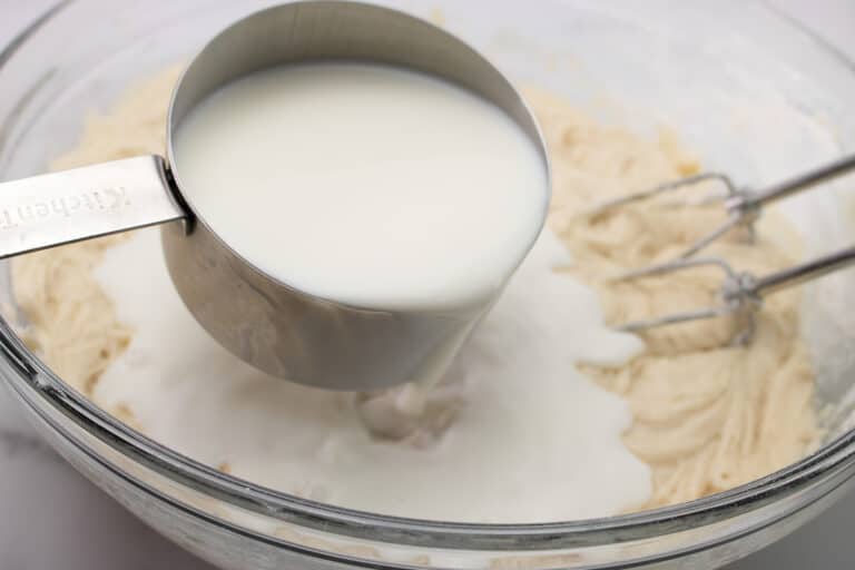 adding milk to batter