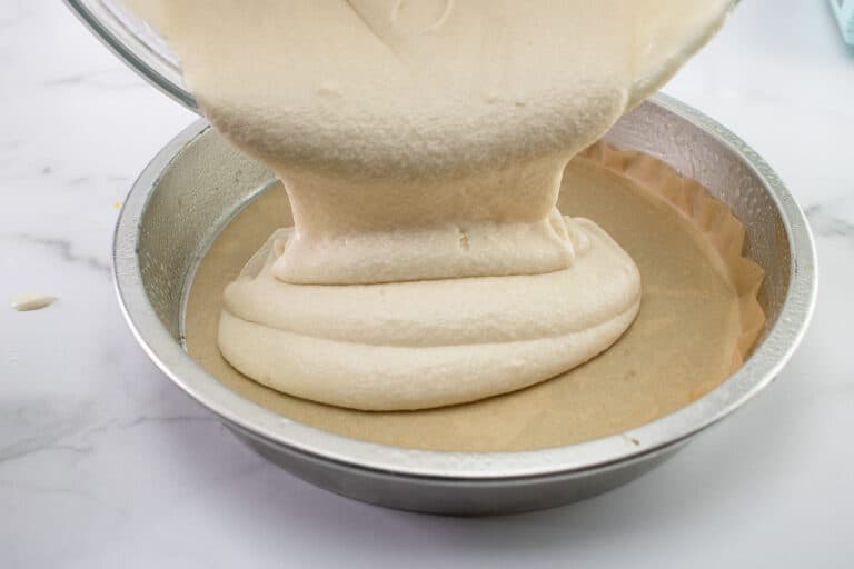 pouring batter into pans