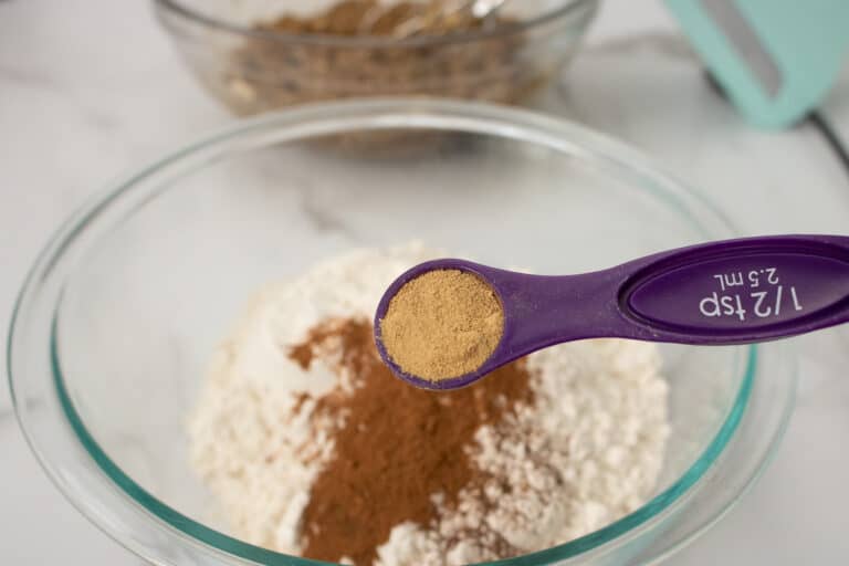 adding spices to flour