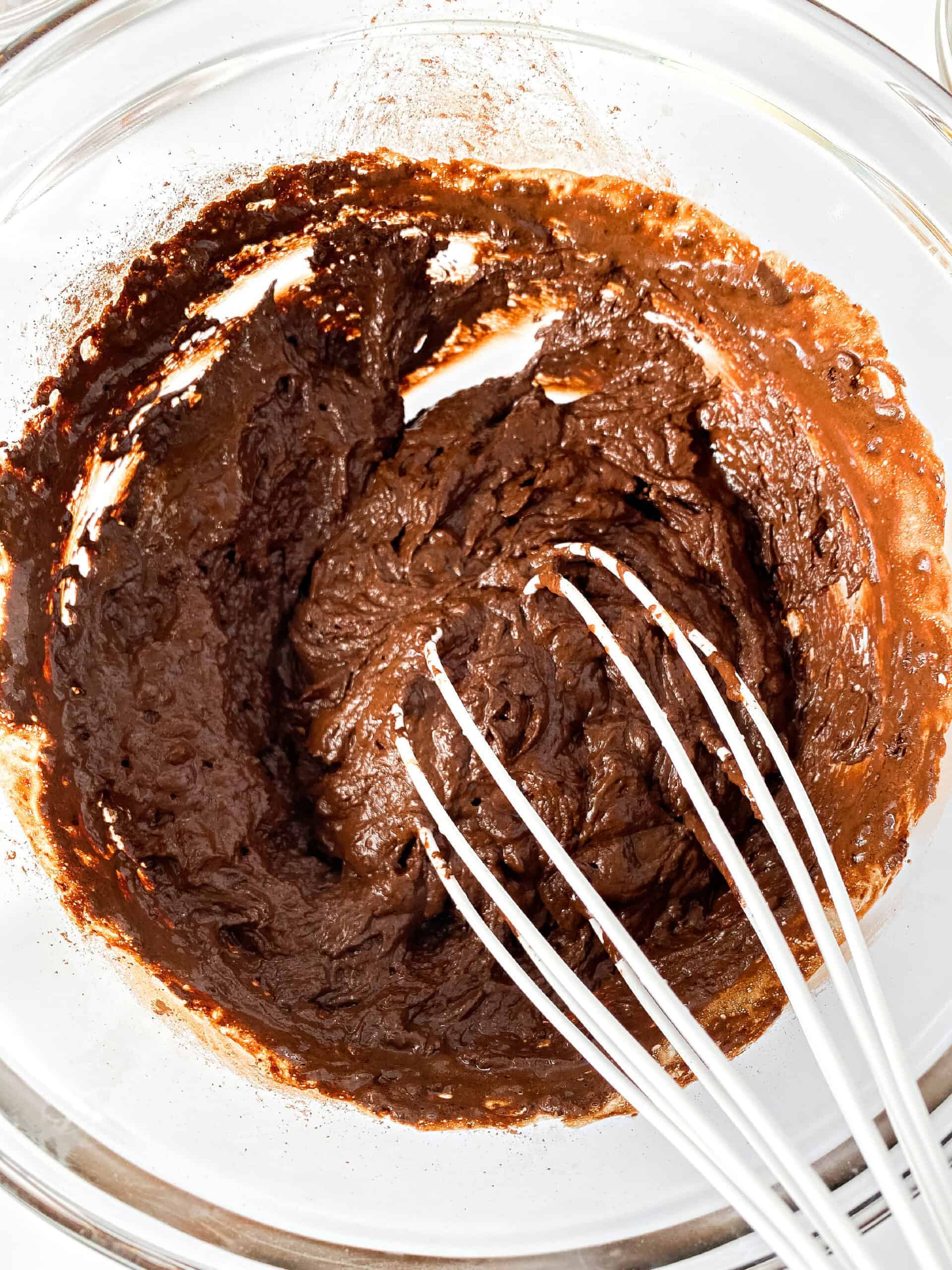 Cocoa powder mixed with coconut oil and hot water.