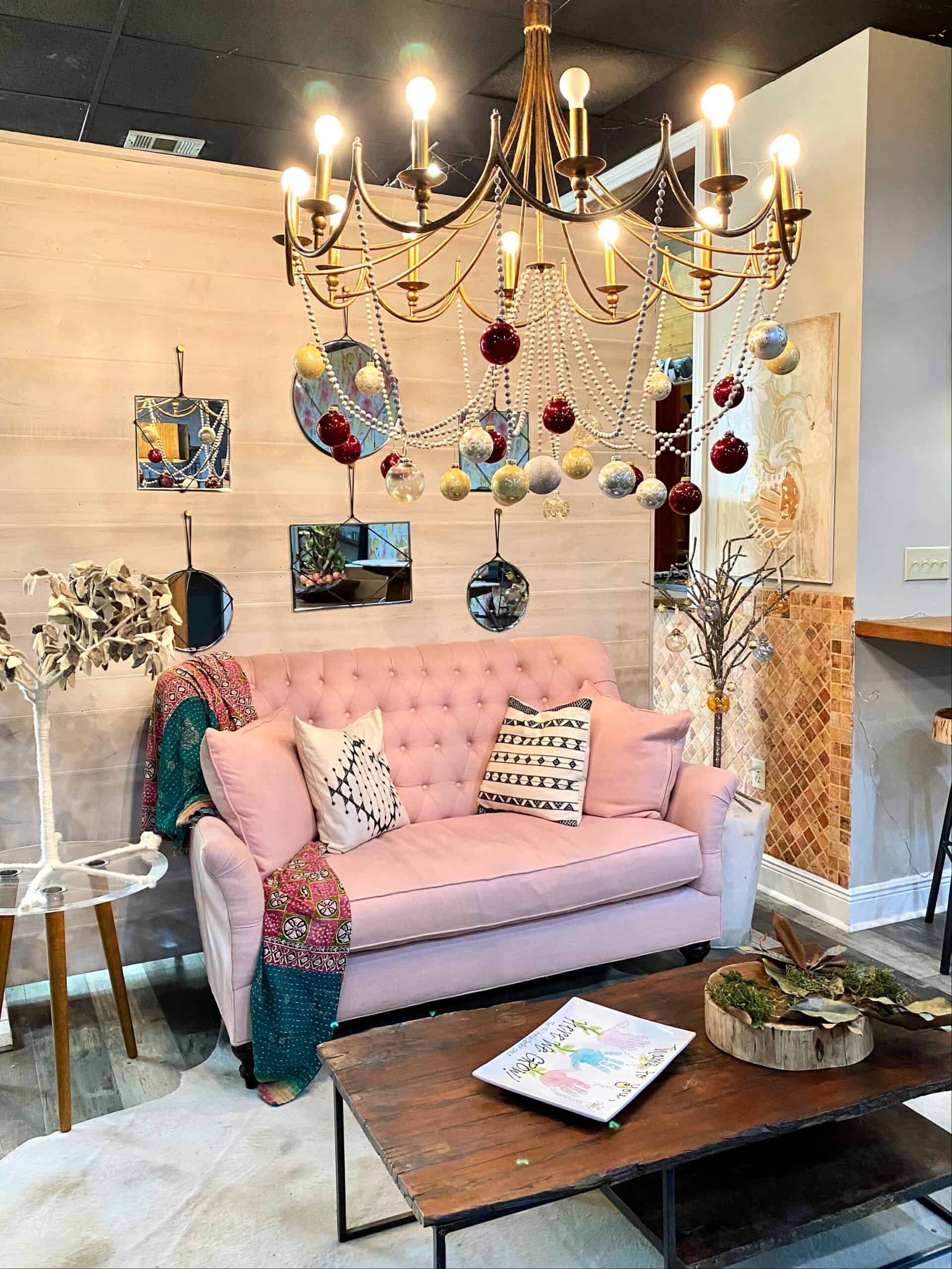 Pink sofa inside of the Birdhouse Cafe.