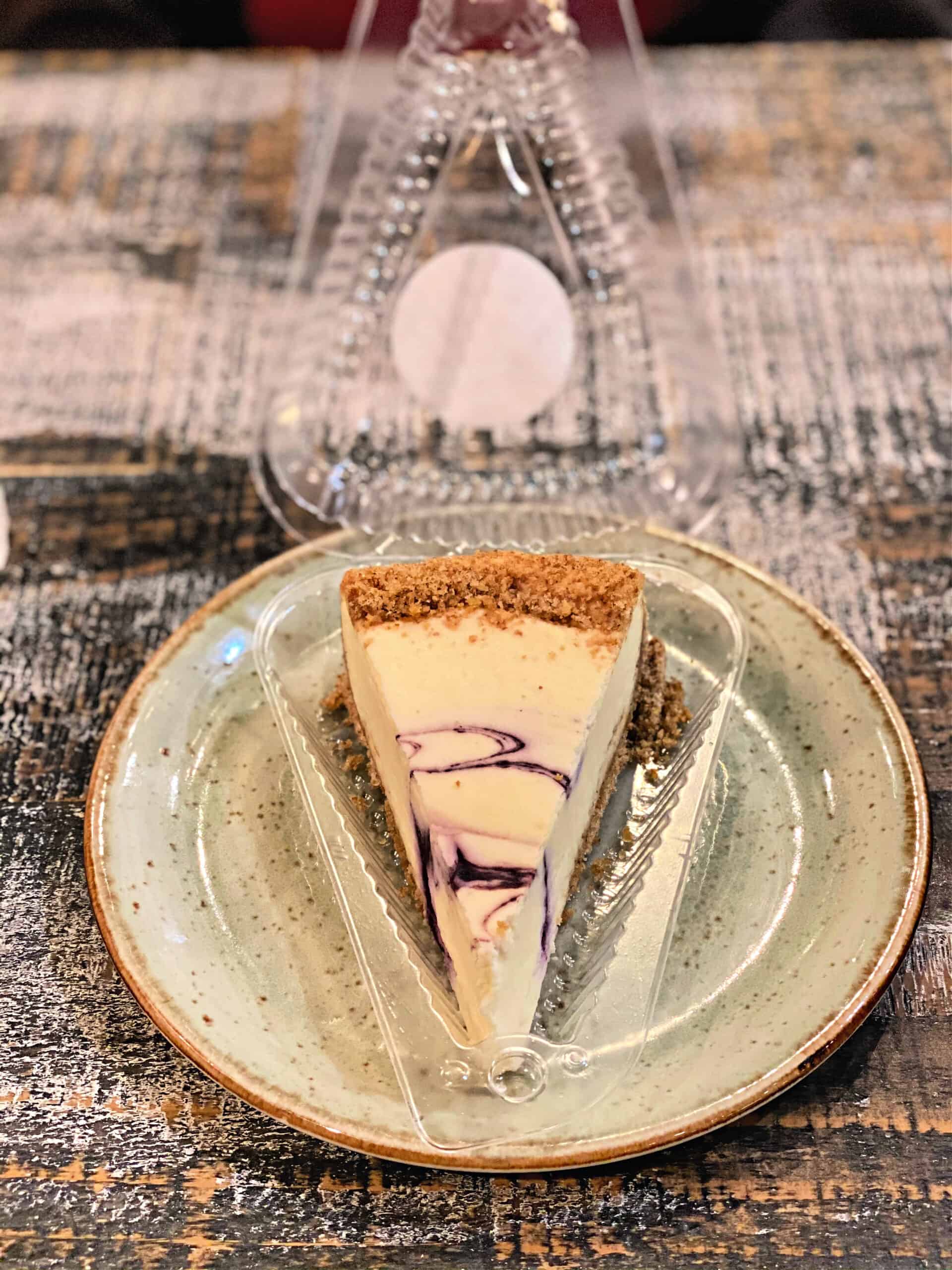 A slice of blueberry cheesecake.