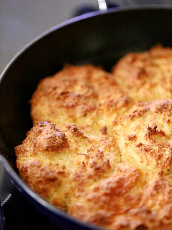 Keto Cheddar Bay Biscuits - a low-carb (clone) version of the famous biscuits at Red Lobster. pan of cheddar biscuits