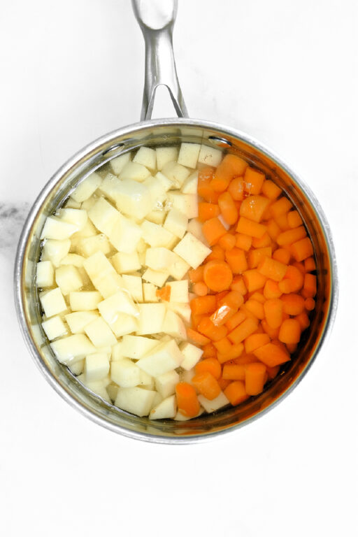 potatoes and carrots in a pot