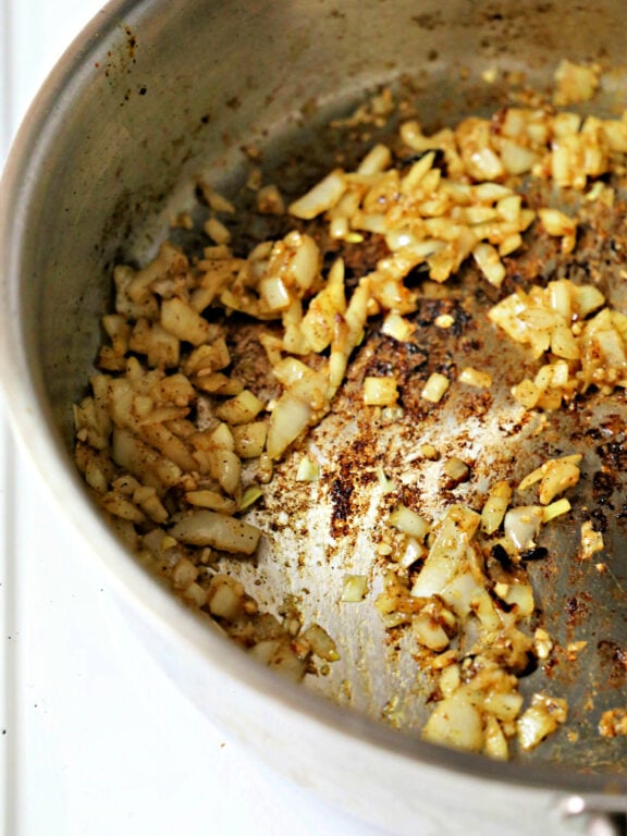 sauteeing onions in a skillet