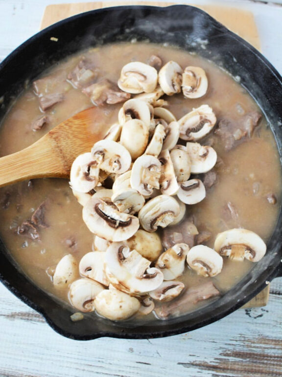 Easy Beef Stroganoff with Mushroom is quick 30 minute and under meal with big homemade flavors #beef #easydinner #recipe adding mushrooms to stroganoff