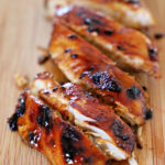 grilled Caribbean chicken on a cutting board