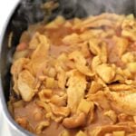 massaman curry cooking in a skillet