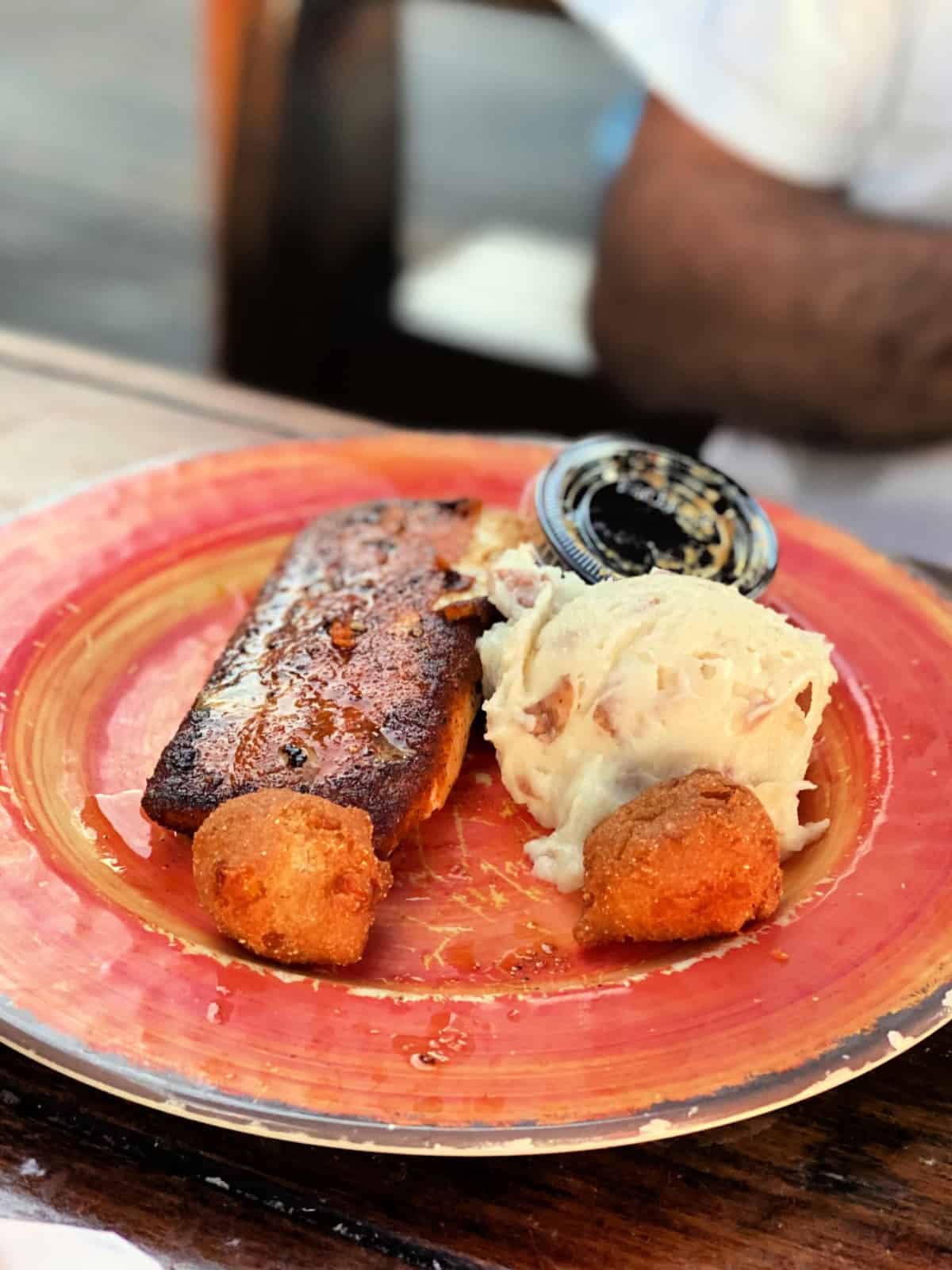Mahi mahi, mashed potatoes, and hush puppies.