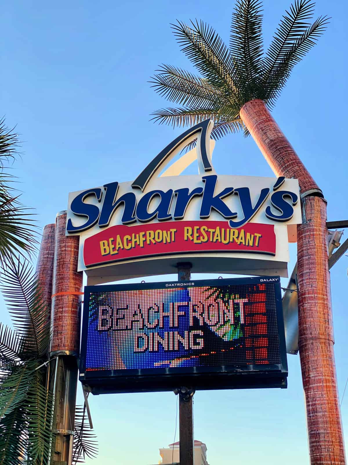Sharky's Beachfront Restaurant sign.