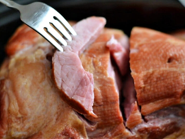 Slow Cooker Ham slice of ham on a fork