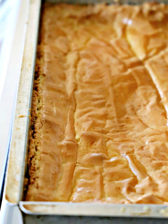 Paula Deen's Ooey Gooey Butter Cake Clone ooey gooey butter cake in a pan