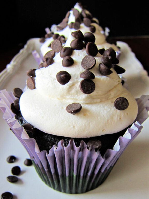 chocolate cupcakes with buttercream frosting and chocolate chips