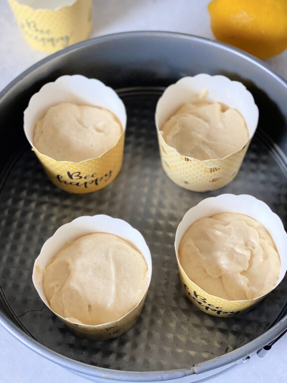 cupcakes in a pan to be baked