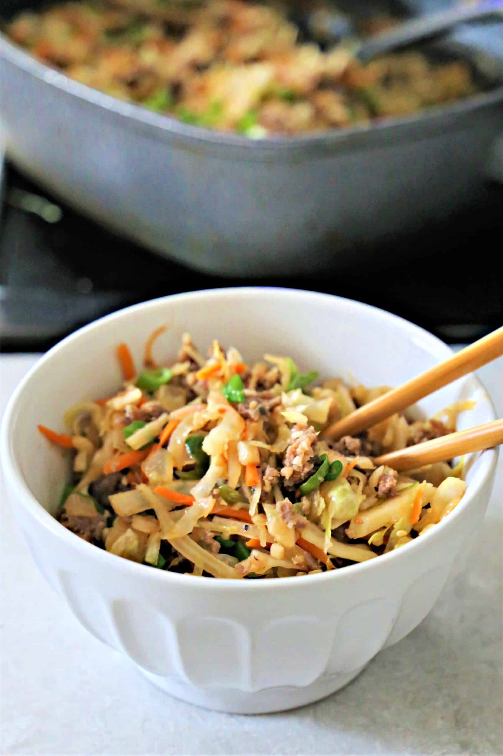 Pork Egg Roll in a Bowl bowl of shredded cabbage and sausage