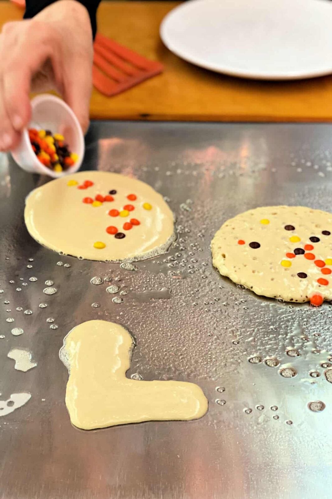 Pancakes on a griddle.