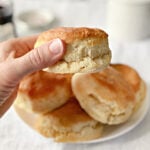 woman holding a Southern biscuit