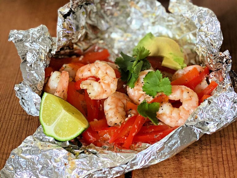 shrimp packet with red bell peppers, cilantro, avocado and lime