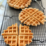 waffles cooling on a wire rack