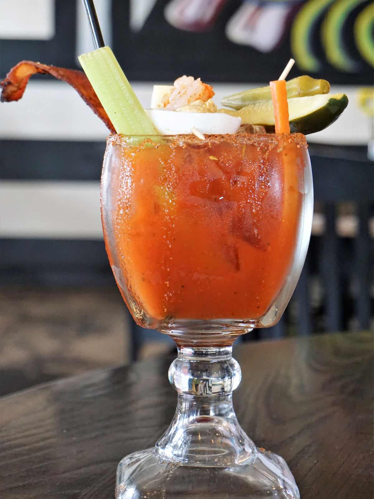Bloody Mary with celery, hard boiled egg, and pickles.