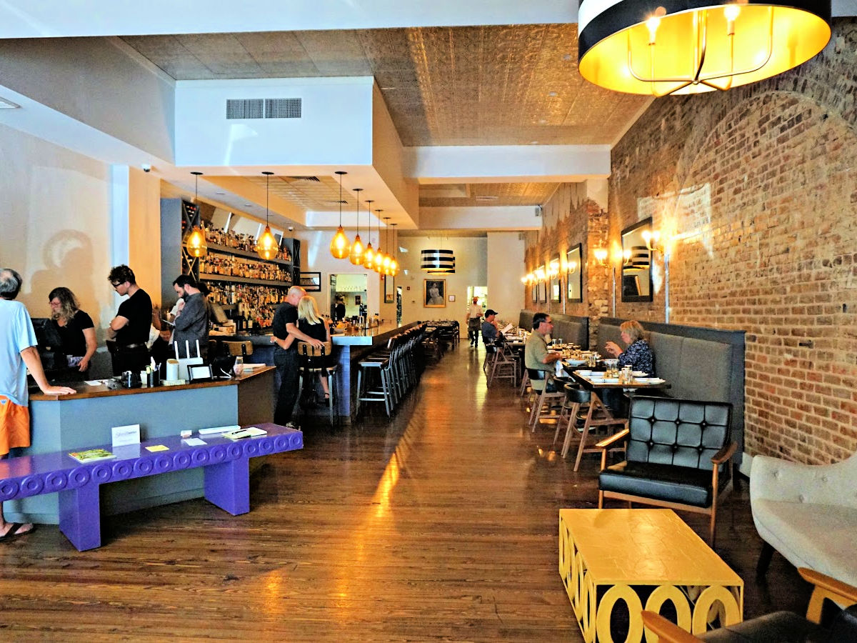 Where To Dine In the Shoals People dining at tables at Odette restaurant.