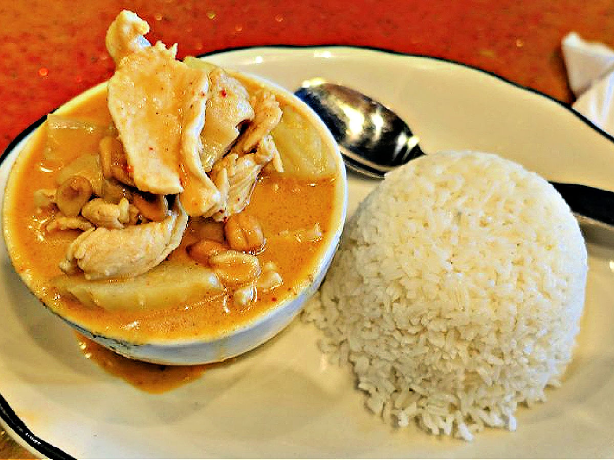Musamun Curry Bowl of Massaman Curry with a side of white rice.
