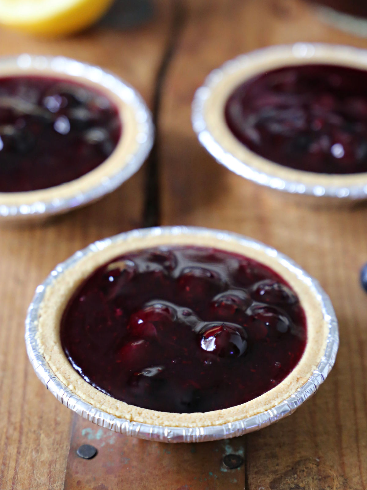 blueberry pie filling in miniature graham cracker crusts