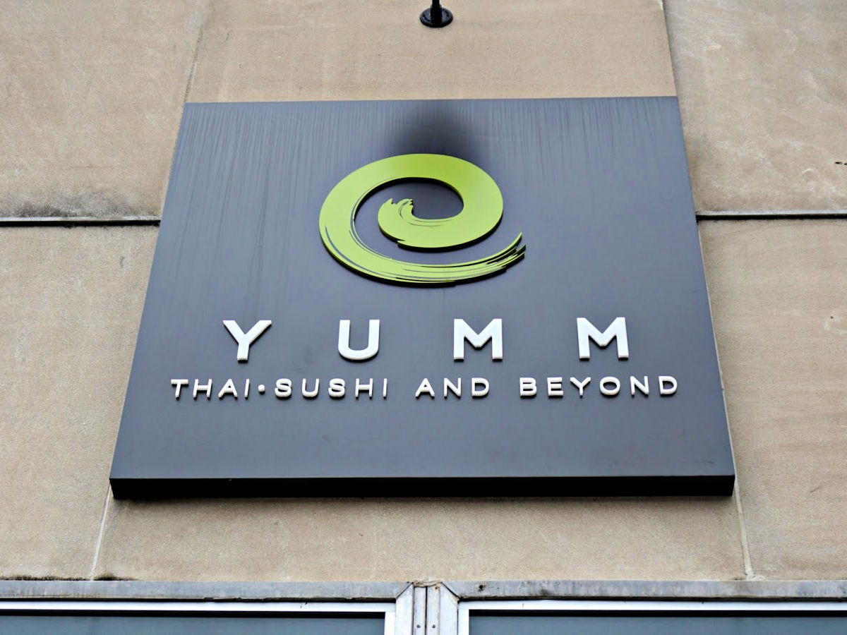Where To Dine In the Shoals Yumm Thai Sushi and Beyond Restaurant sign.