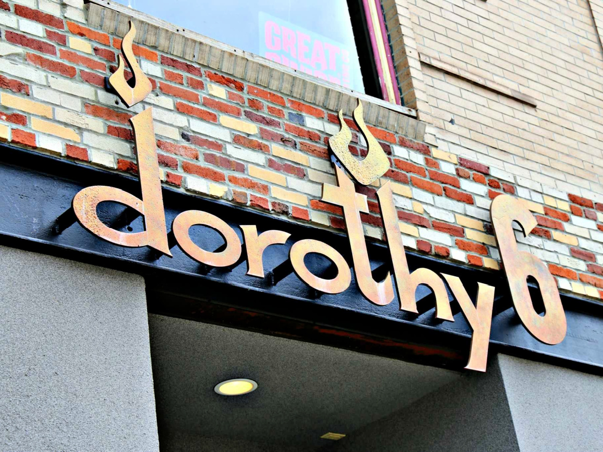 Where To Eat in Pittsburgh Front of Dorothy 6 sign.