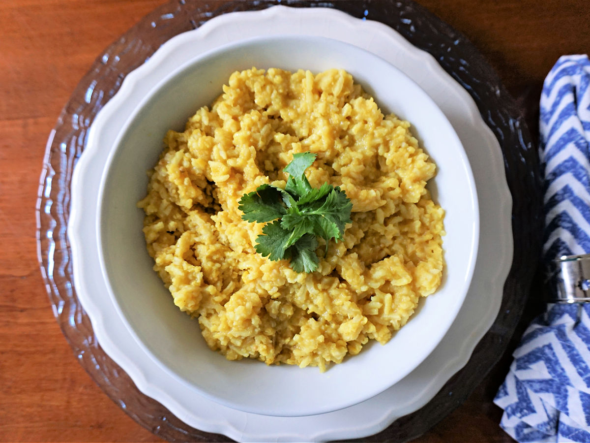 Cooked split yellow mung dahl beans topped with parsley.