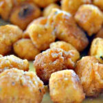 Popcorn tofu nuggets on a plate.