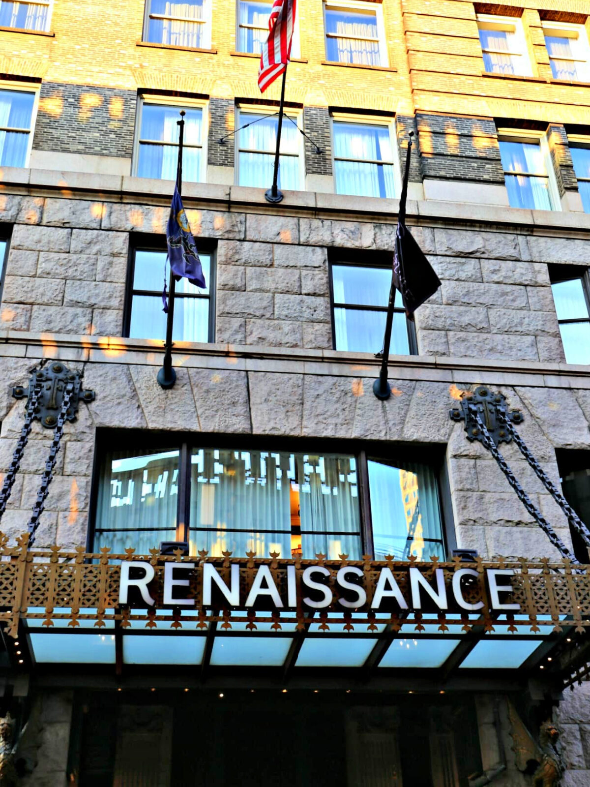 The front of Renaissance Pittsburgh with flags flying.