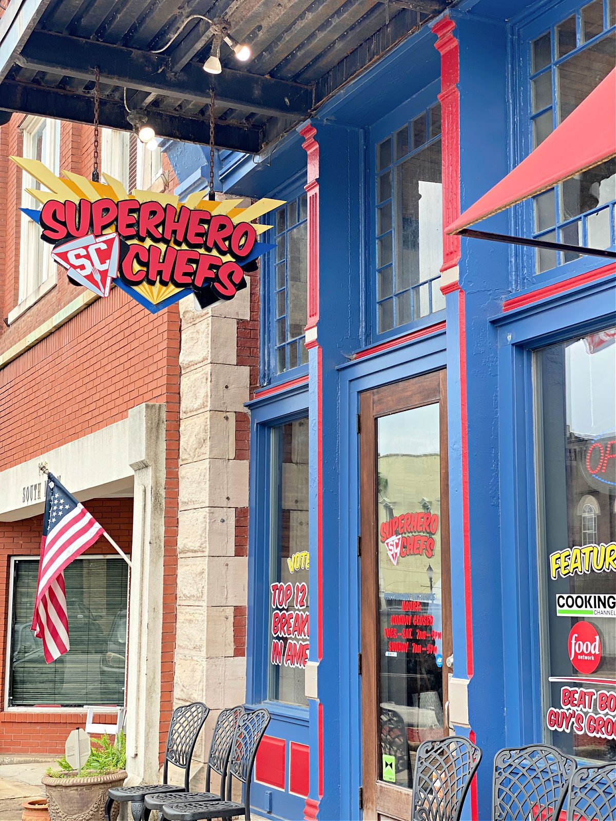 Superhero Chefs restaurant painted red and blue building.
