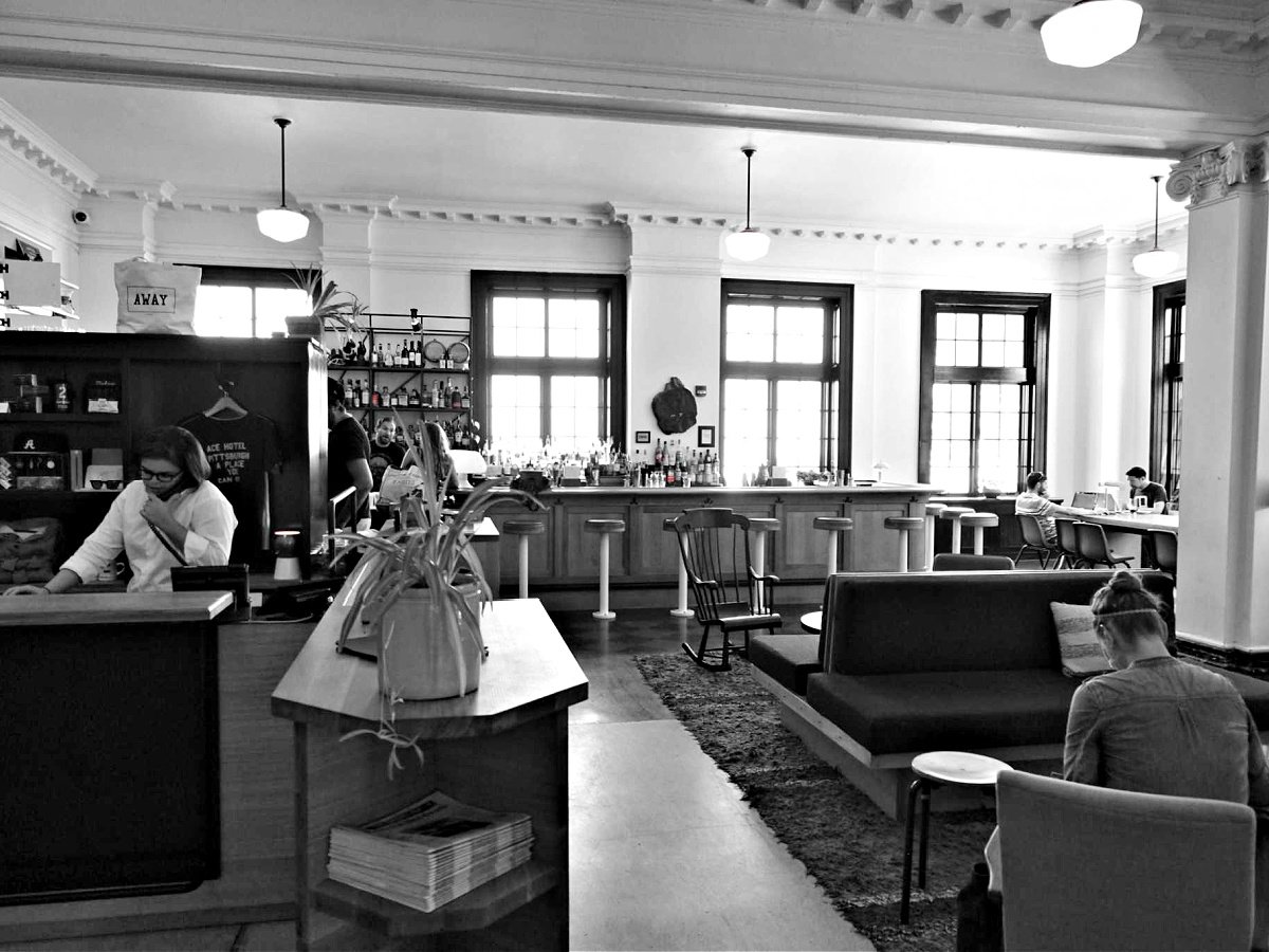 Where To Eat in Pittsburgh Black and white image of Whitfield restaurant located inside the Ace Hotel.