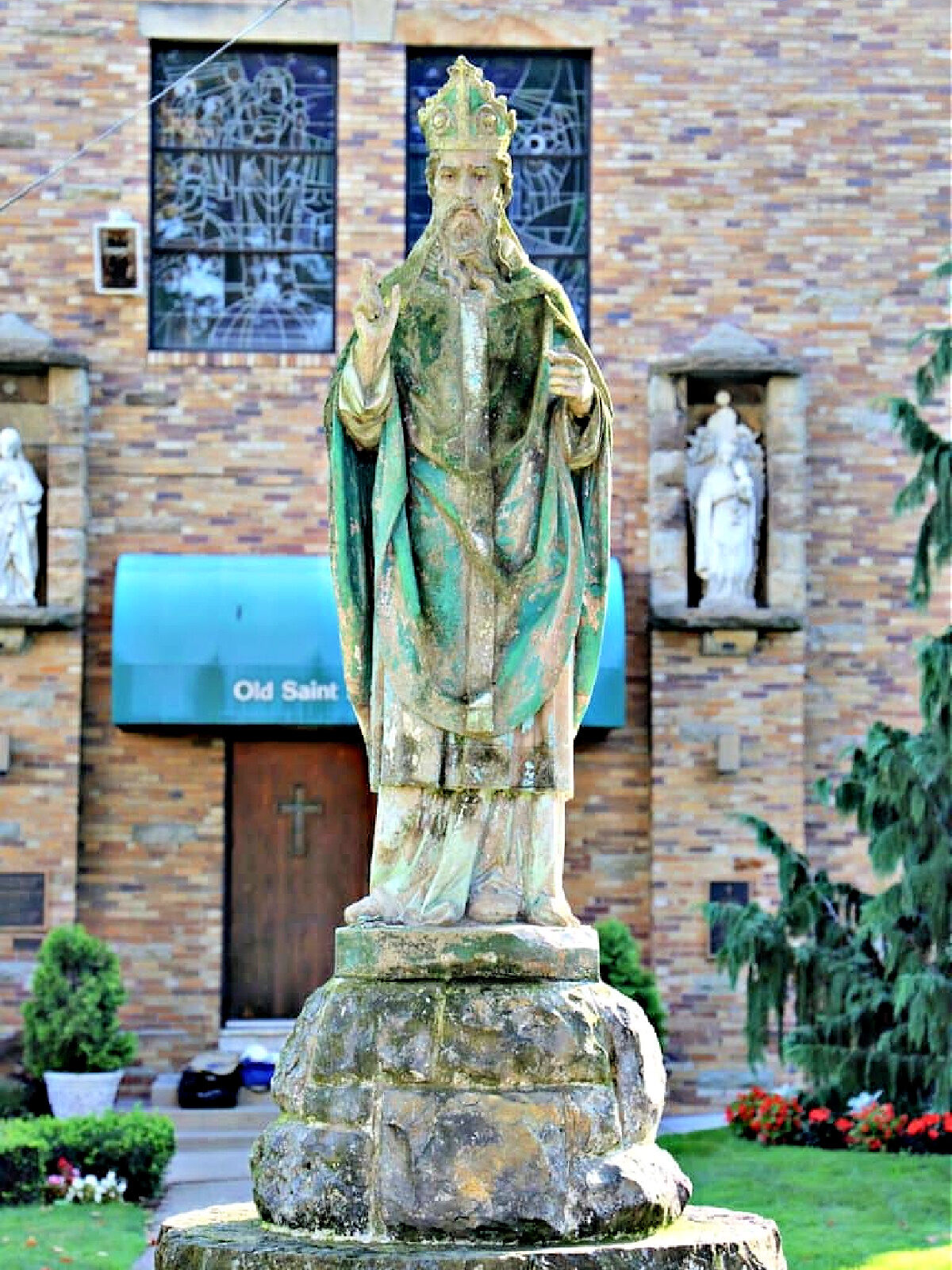 Where To Eat in Pittsburgh Statue in front of Old St. Patrick's Church in Pittsburgh.